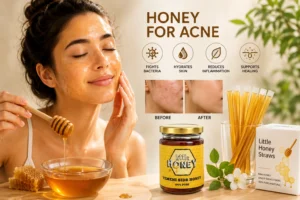 Woman applying face mask with benefits of raw Honey for Acne treatment.